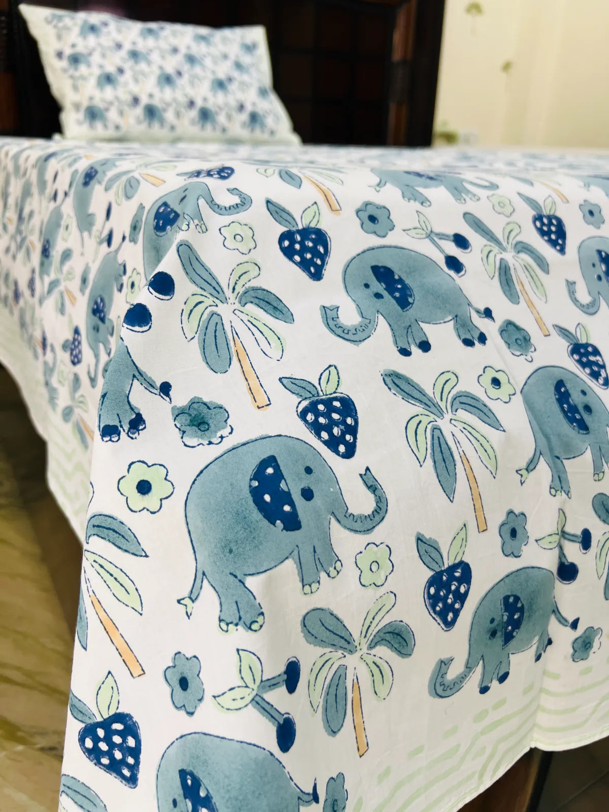 Close up of blue elephant print cotton bedsheet