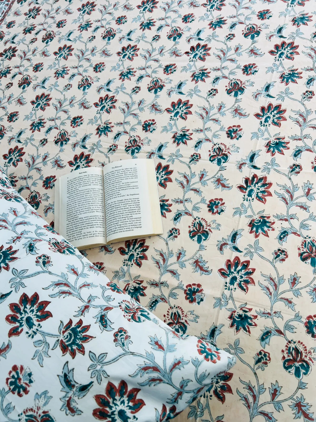 Handcrafted cotton bedsheet with rust floral handblock print