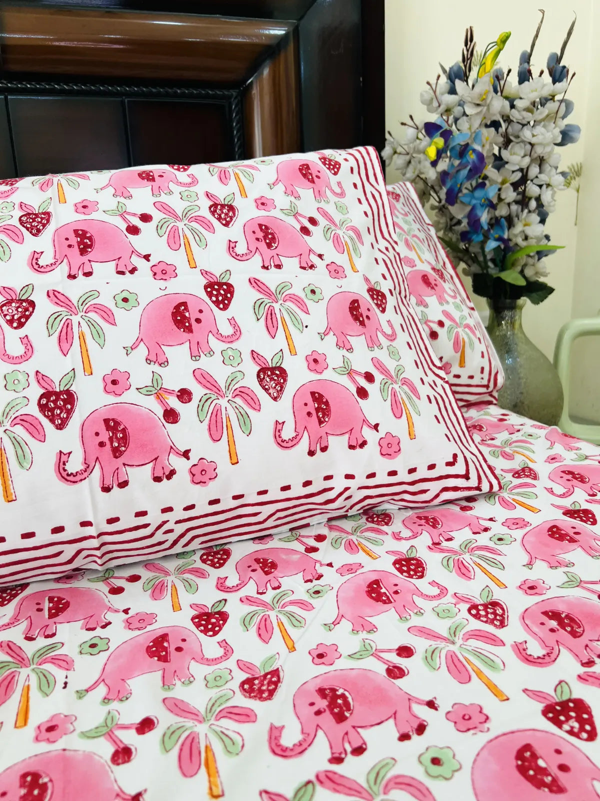 Pink playful cotton bedsheet set with animal print
