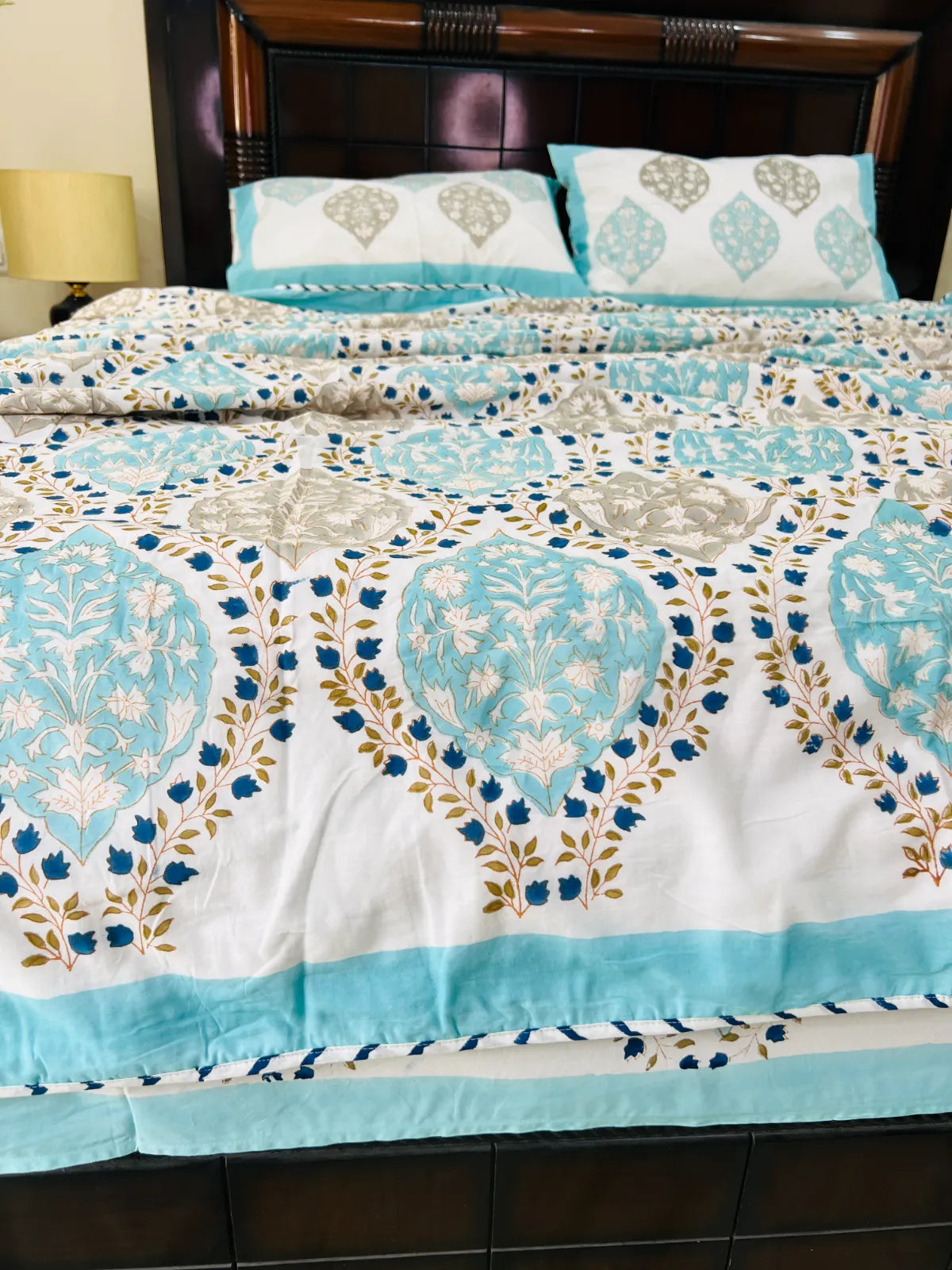 Jaipur Jewel handblock printed muslin cotton dohar styled on a bed