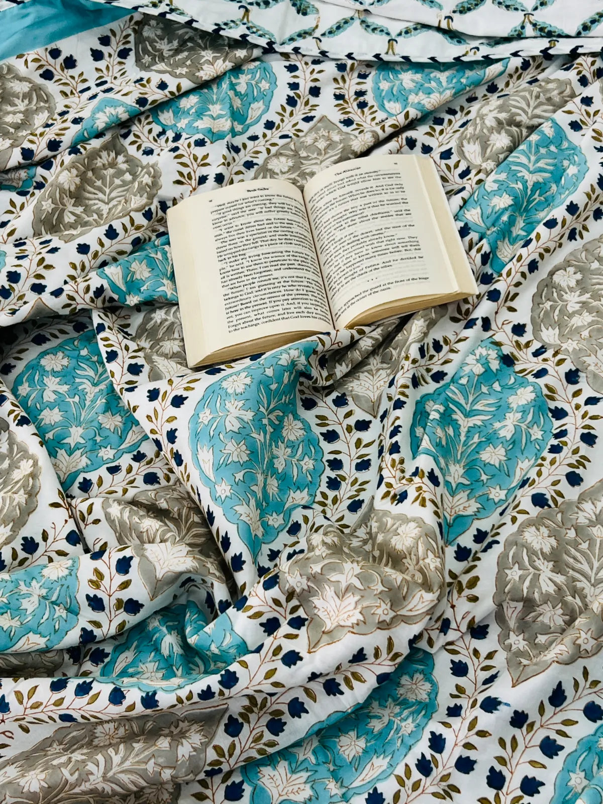 Close-up of turquoise and grey handblock print on muslin cotton dohar