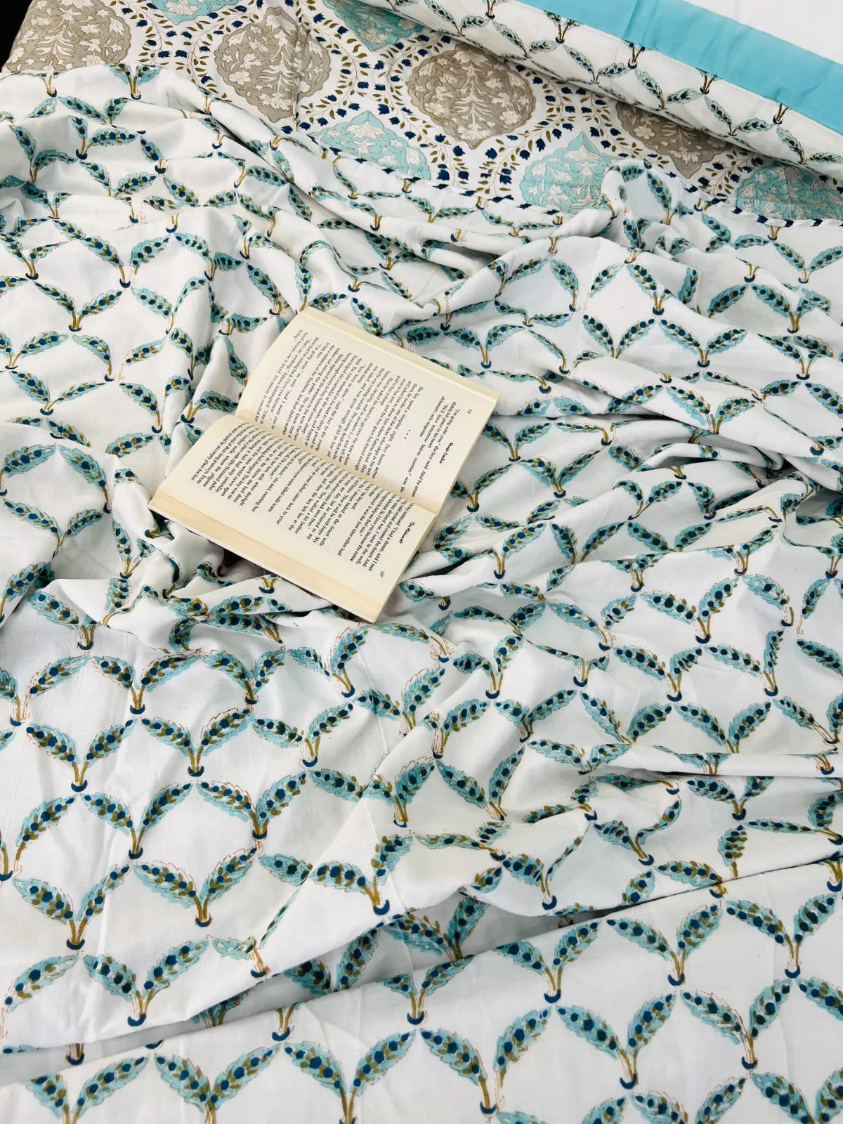 Soft muslin cotton fabric with intricate turquoise and grey handblock print