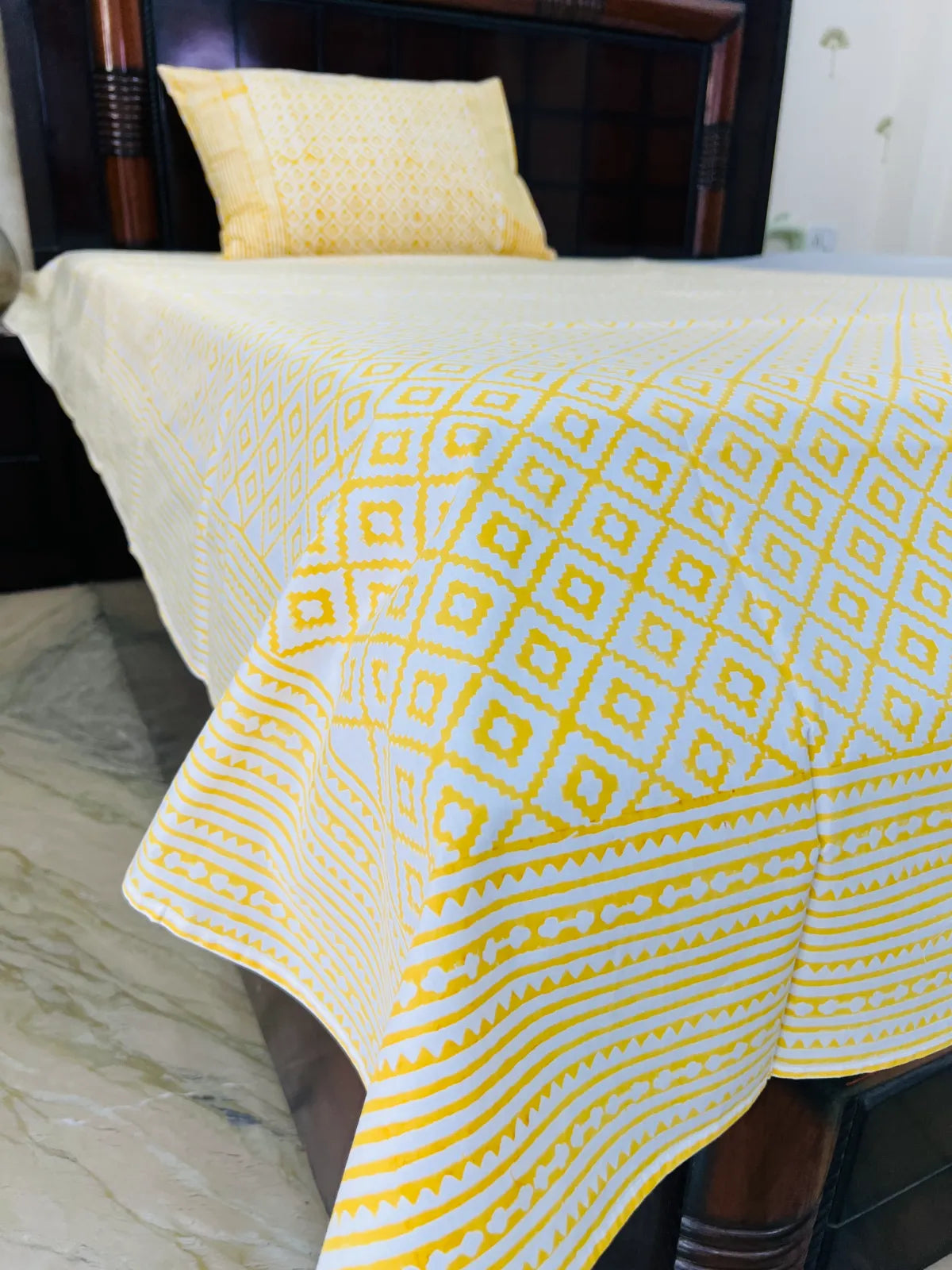 Handblock printed pure cotton single bedsheet in mustard yellow geometric lattice design by House Of Manjari.