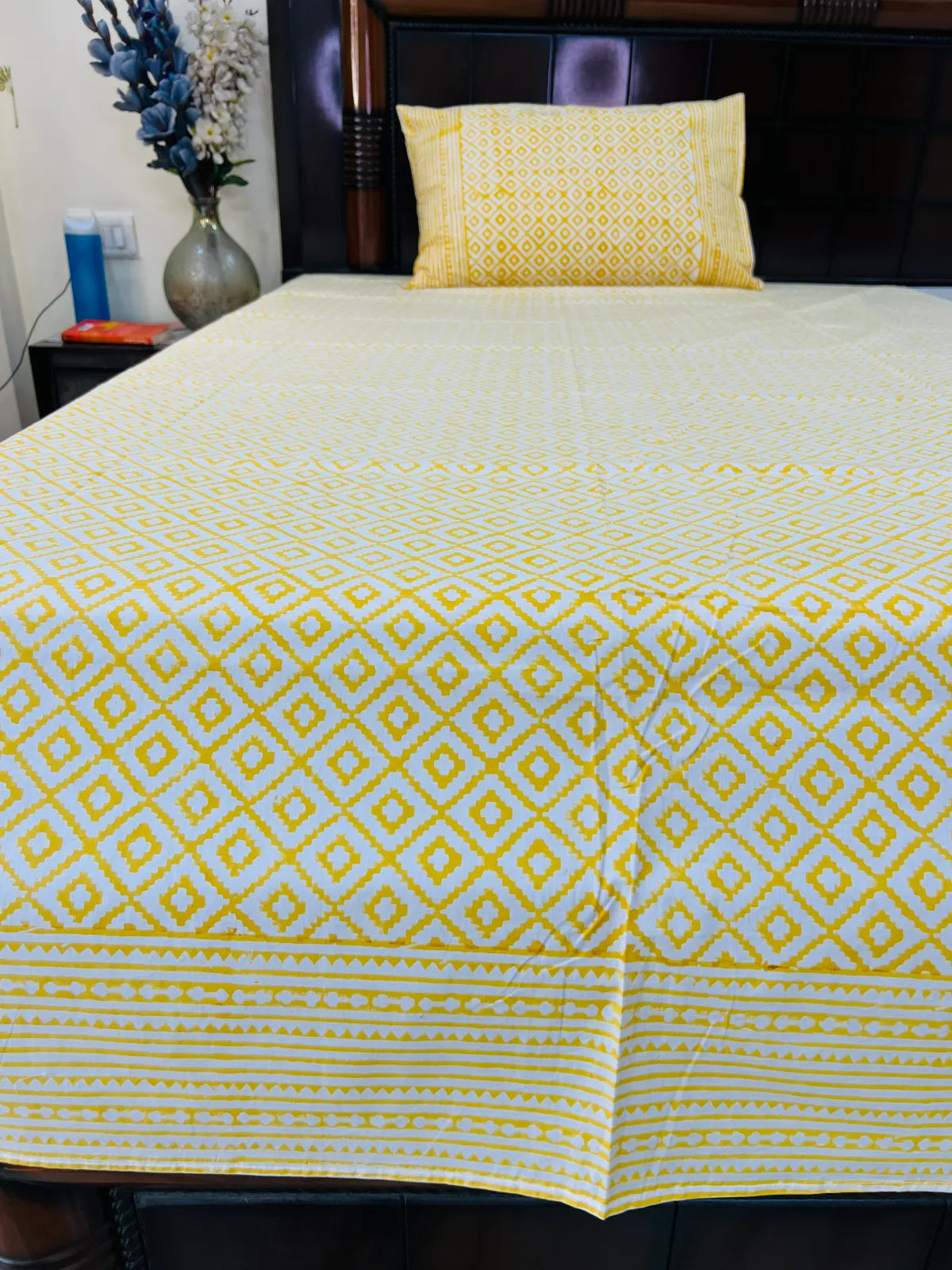 Handblock printed pure cotton single bedsheet in mustard yellow geometric lattice design by House Of Manjari.