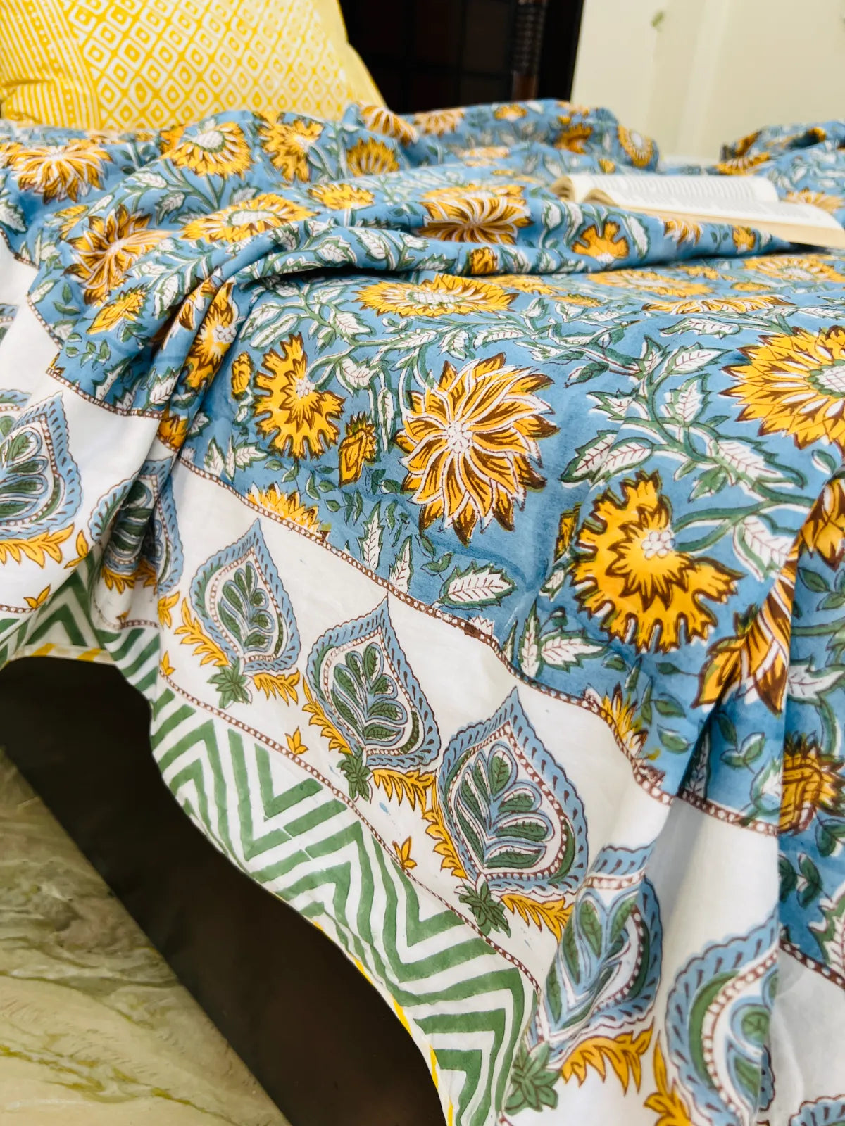 Handblock printed reversible muslin cotton dohar featuring sunflower floral motifs in blue and ivory by House Of Manjari.